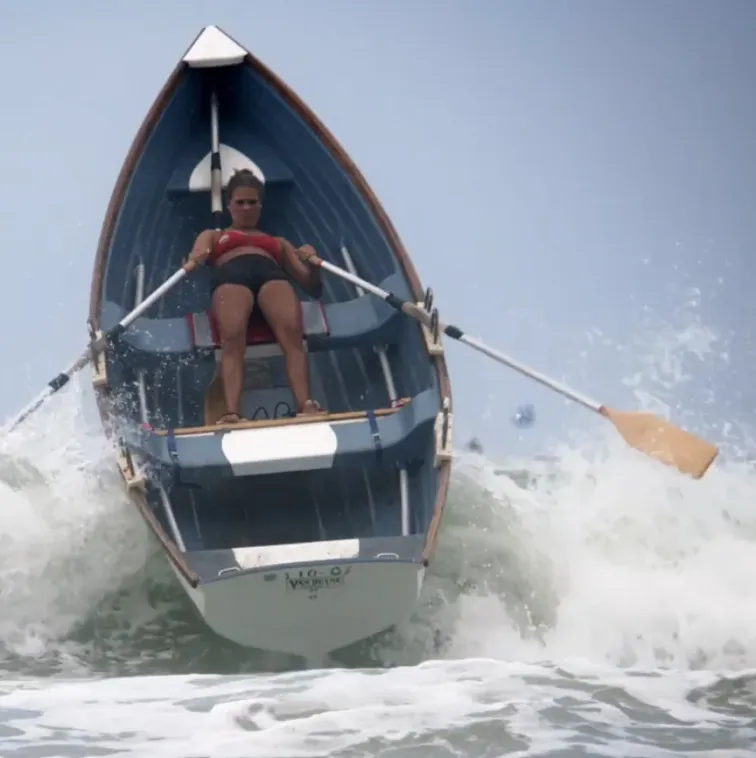 Girl rowing boat